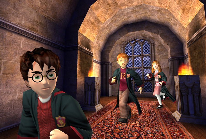 Harry Potter, Ron Weasley, and Hermione Granger running through a Hogwarts hallway in the PC version.